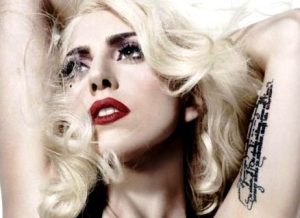 Lady Gaga's German quote tattoo on her left inner arm