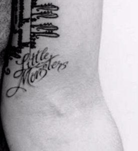 Lady Gaga's Little Monsters tattoo on her left inner arm
