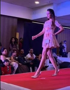 Noor during a modeling event